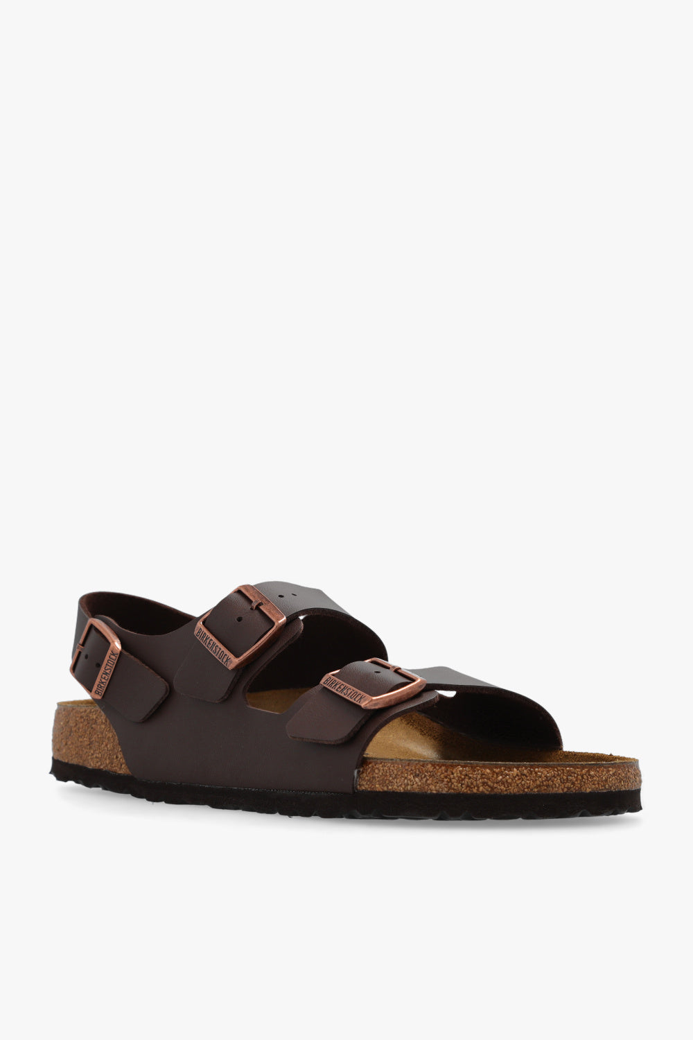 Brown sandal with cork sole on a white background