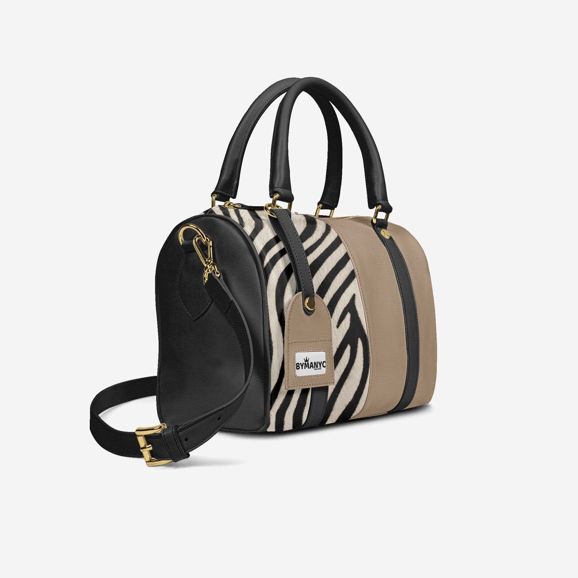 Handbag with zebra print and beige sections on a white background