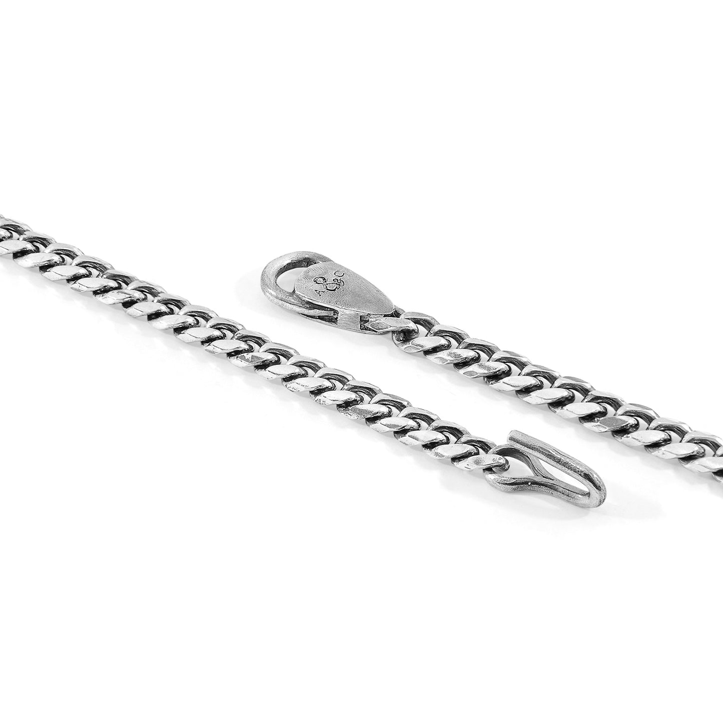 Silver chain with clasp on a white background