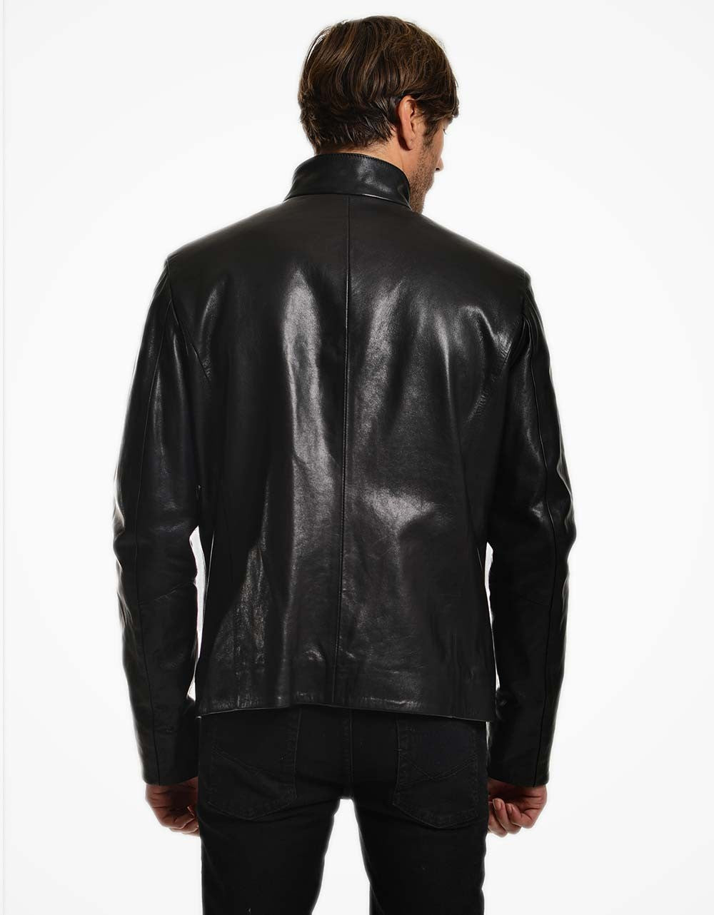 Person wearing a black leather jacket on a white background
