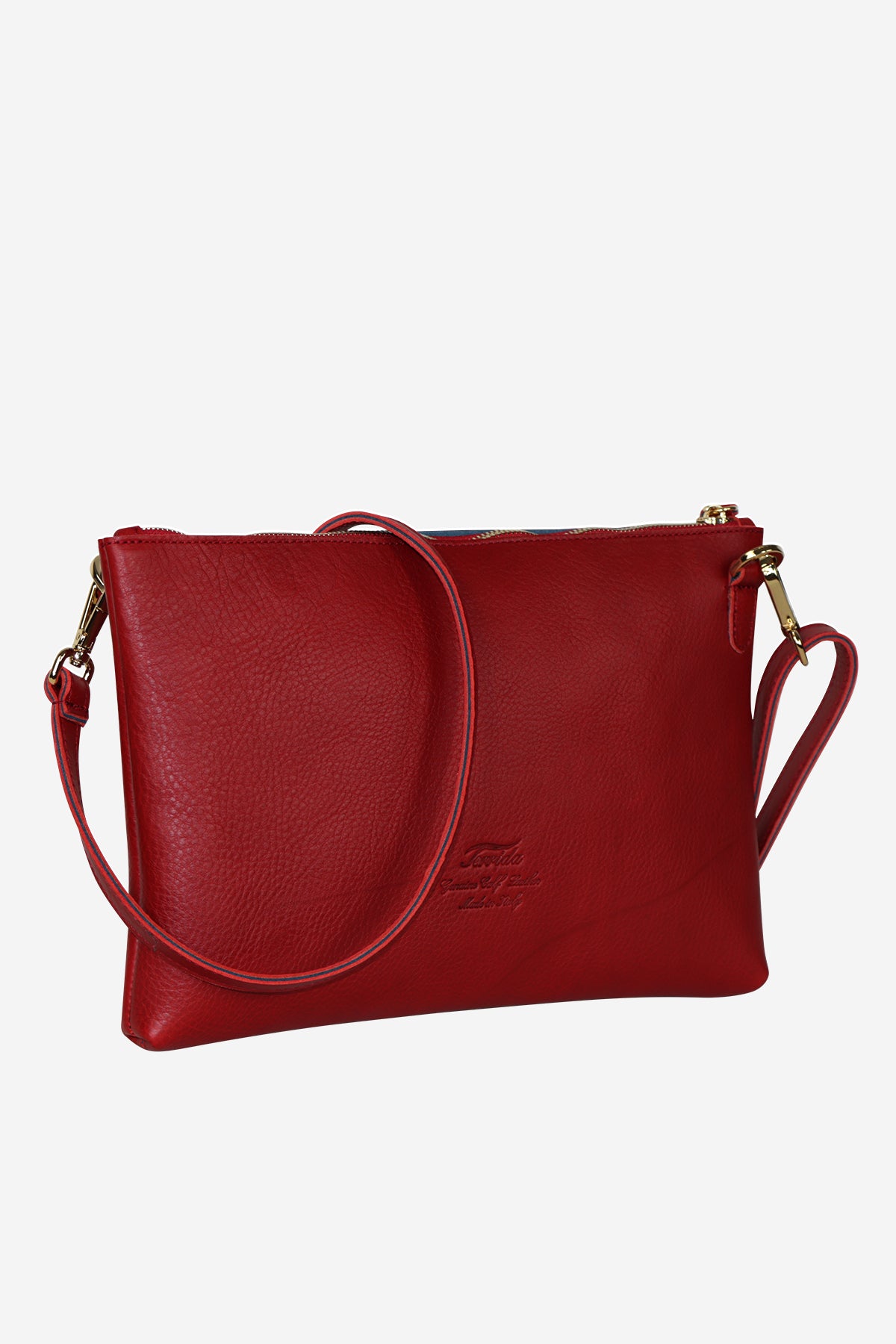 Red leather handbag with a strap on a white background