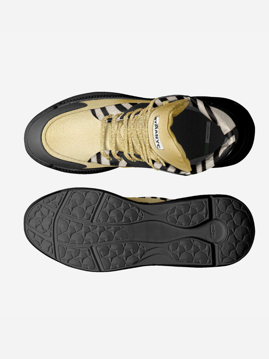 Top and bottom views of a sneaker with a zebra pattern on a white background
