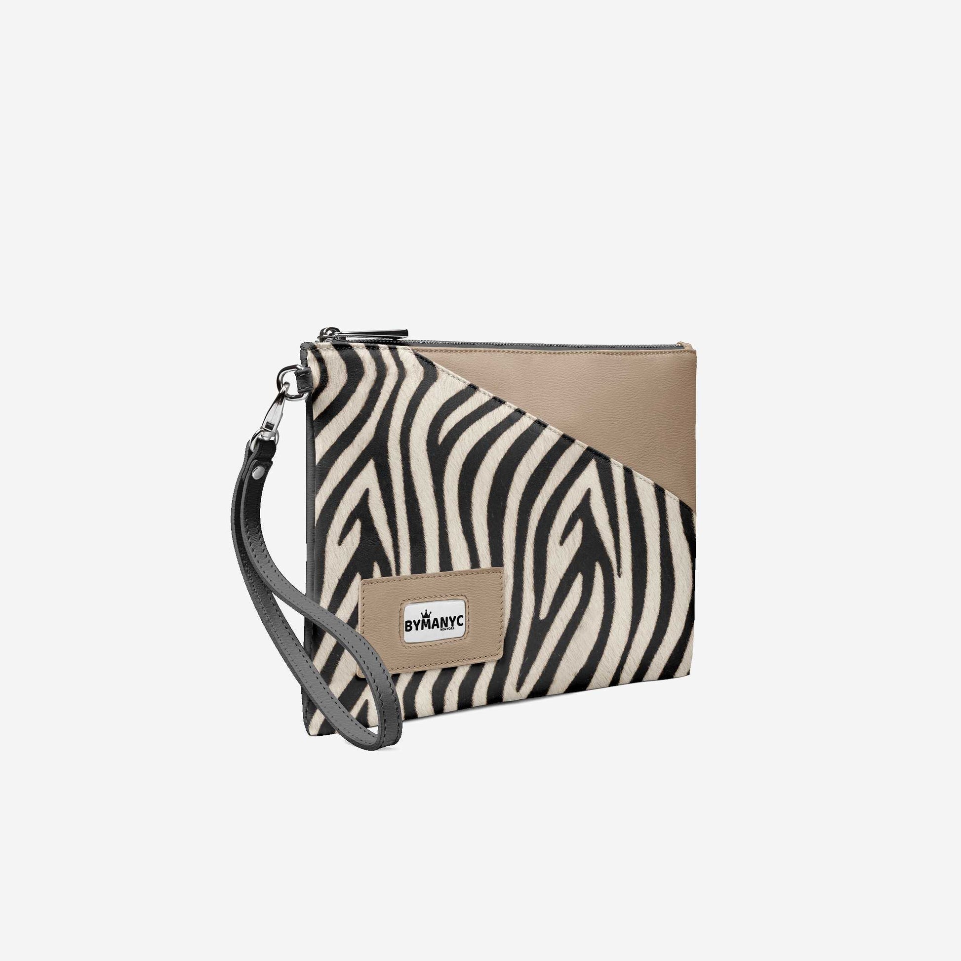 Zebra print clutch bag with beige accents on a white background