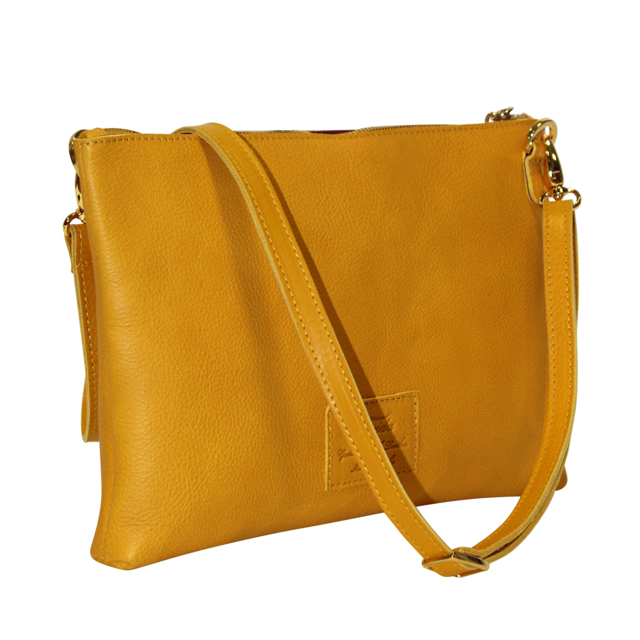 Yellow leather crossbody bag on a white background