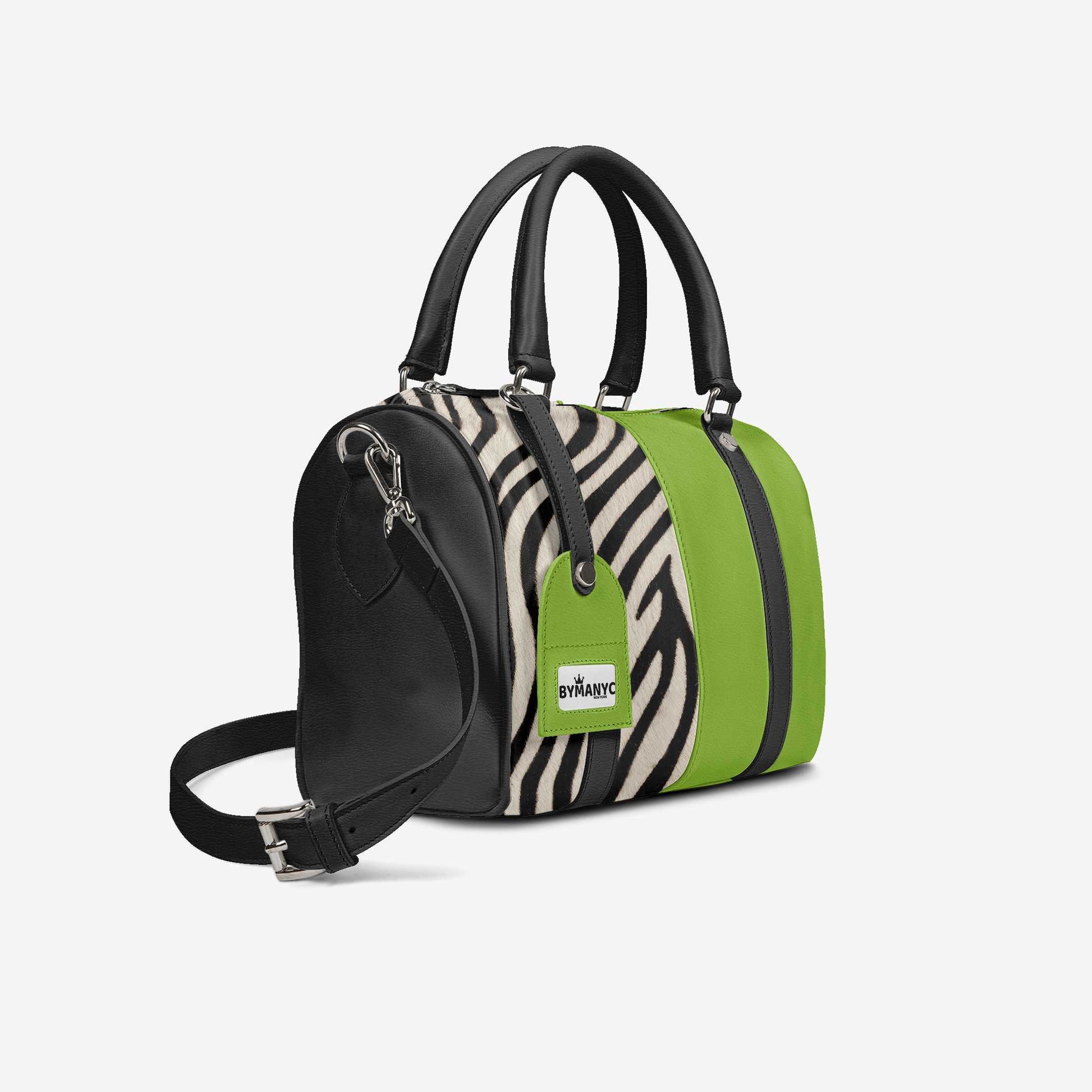 Handbag with zebra pattern and green accents on a white background