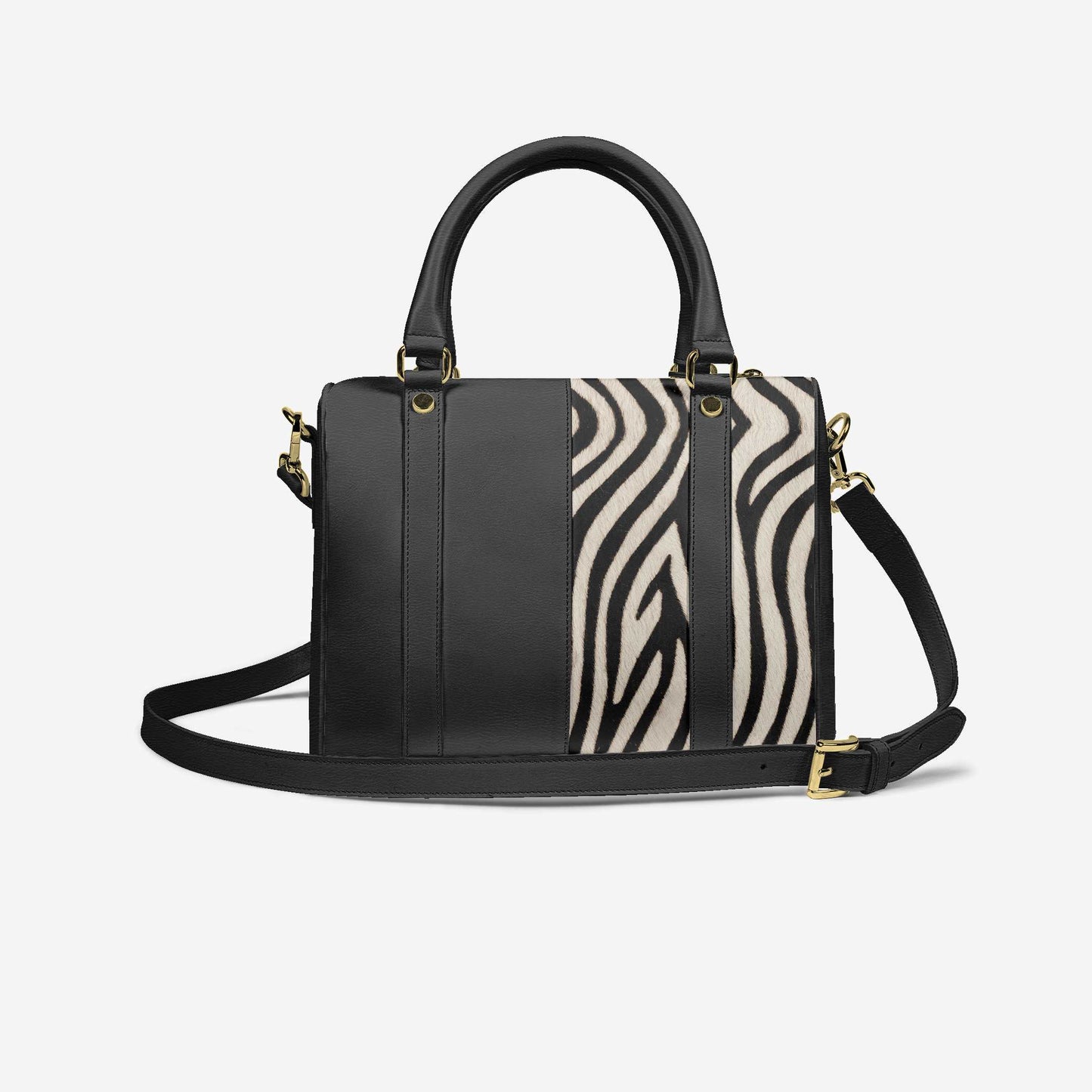 Black handbag with zebra print detail on a white background
