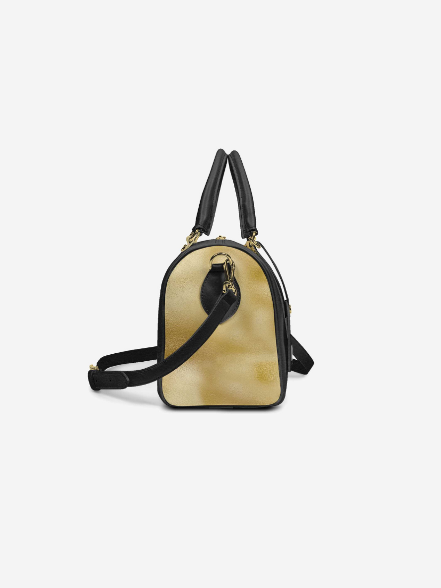 Small backpack with a gold and black design on a white background