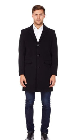 Man wearing a black coat.