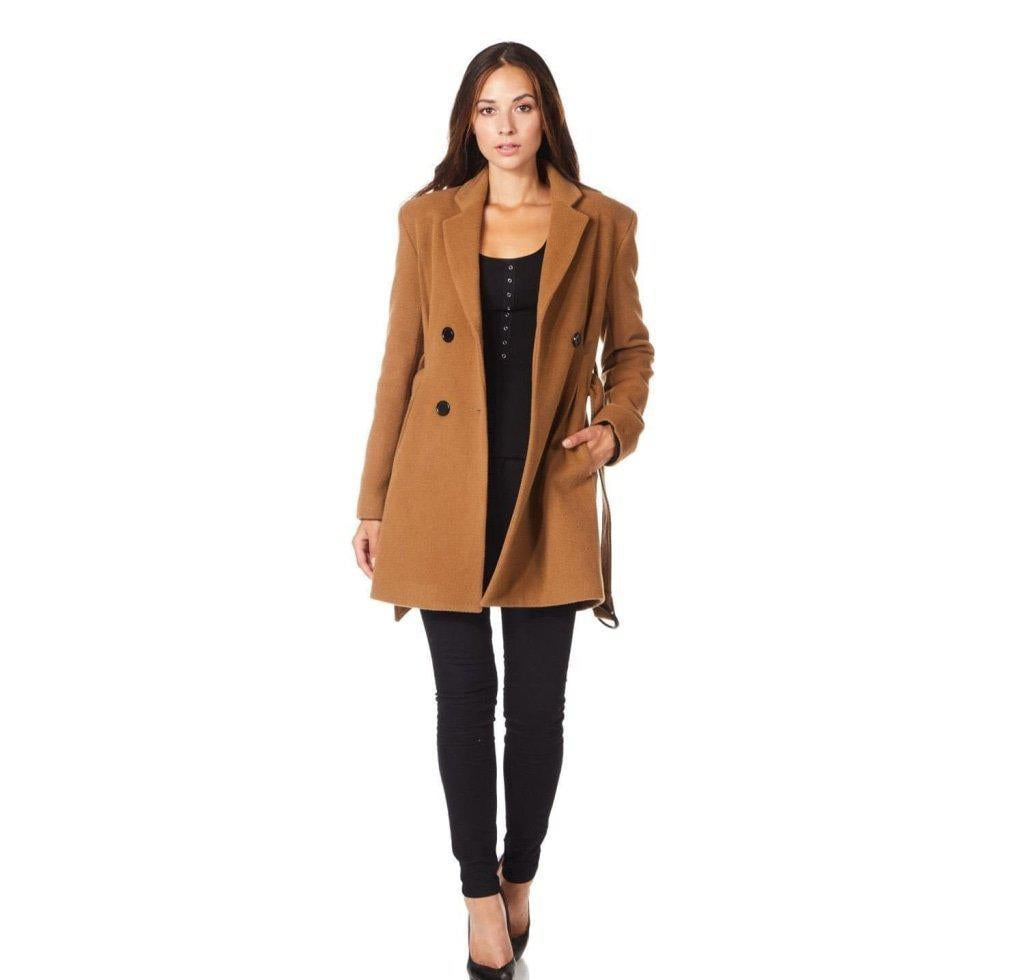 Woman wearing a brown coat on a white background