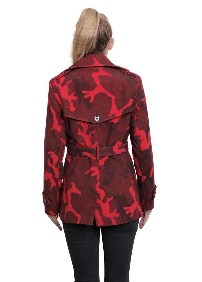 Red camouflage jacket with deer pattern worn by a model on a white background