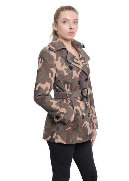 Woman wearing a camouflage coat on a white background