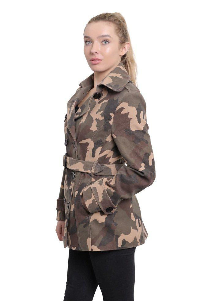 Woman wearing a camouflage jacket on a white background