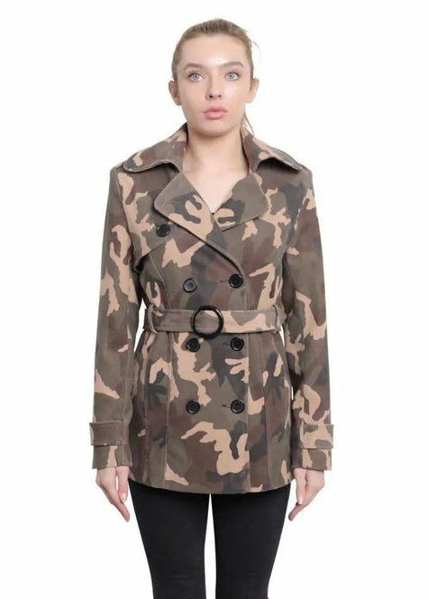 Woman wearing a camouflage coat on a white background