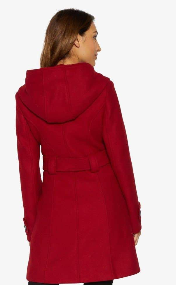 Red coat with a hood worn by a person on a white background.