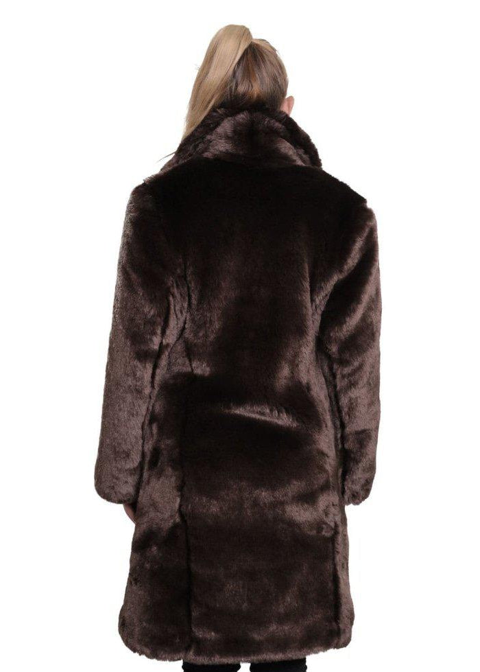 Brown fur coat worn by a person on a white background