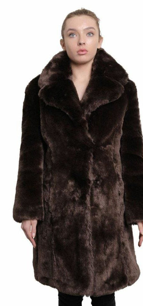 Woman wearing a brown fur coat
