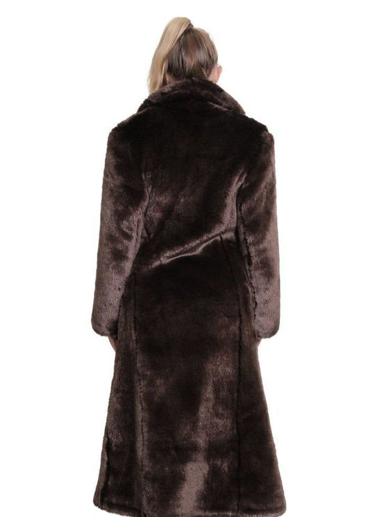 Brown fur coat worn by a person on a white background