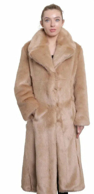 Beige fur coat worn by a model on a white background