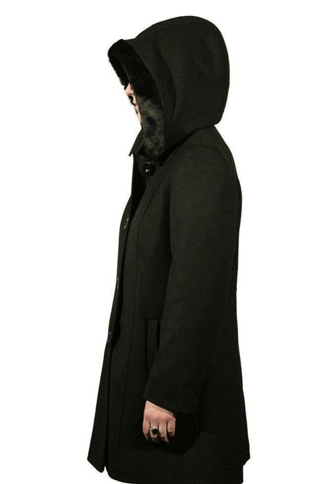 Black hooded coat worn by a person on a white background