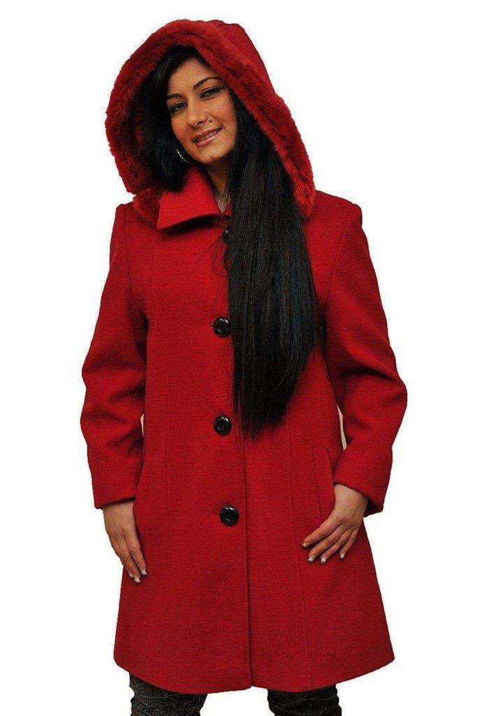 Woman wearing a red coat with a hood on a white background