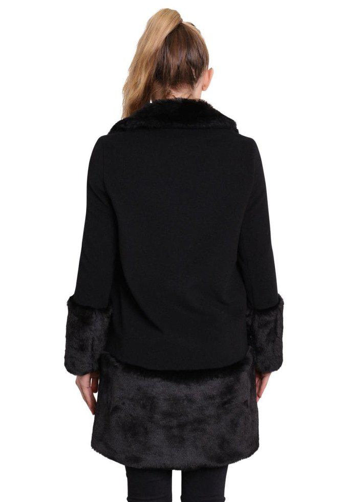 Black coat with fur trim on a white background