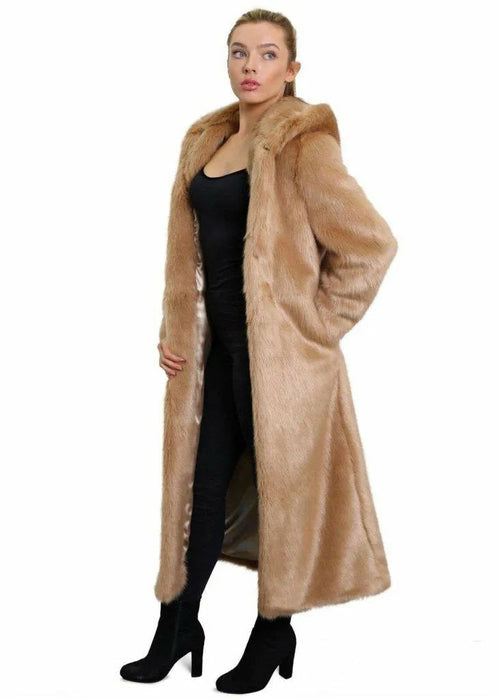 Woman wearing a long beige fur coat on a white background