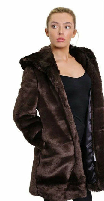 Woman wearing a brown fur coat on a white background