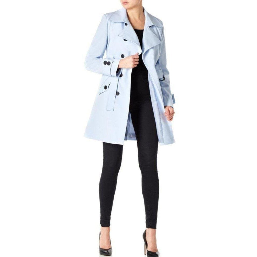 Light blue trench coat worn by a person on a white background