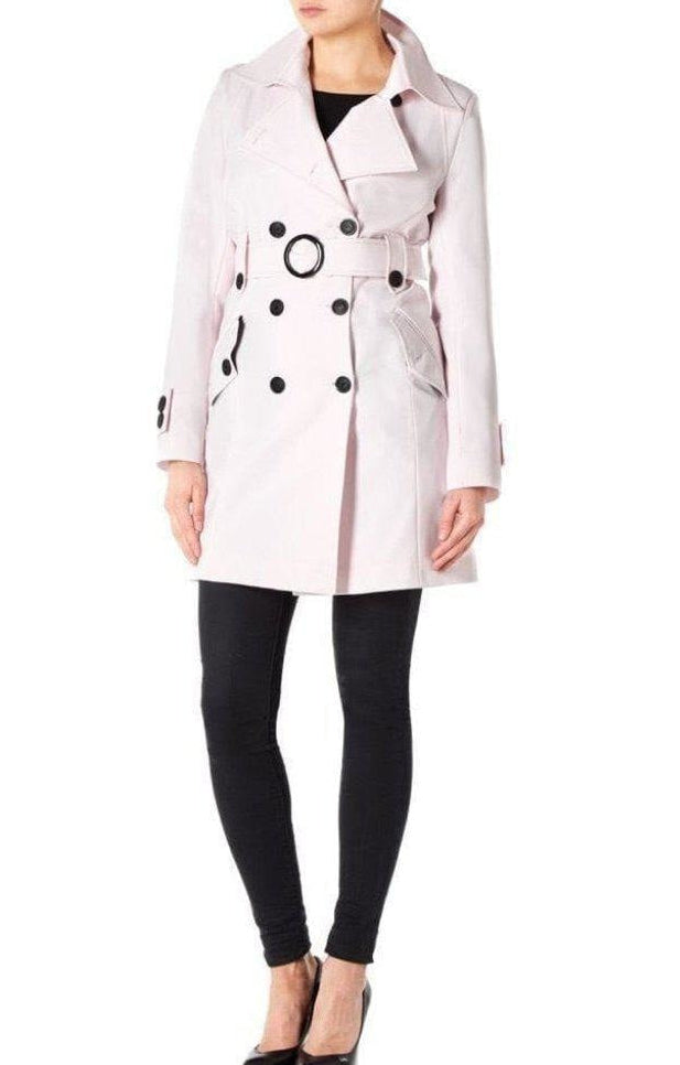 White trench coat with black buttons on a white background, featuring a 'Sale' label.