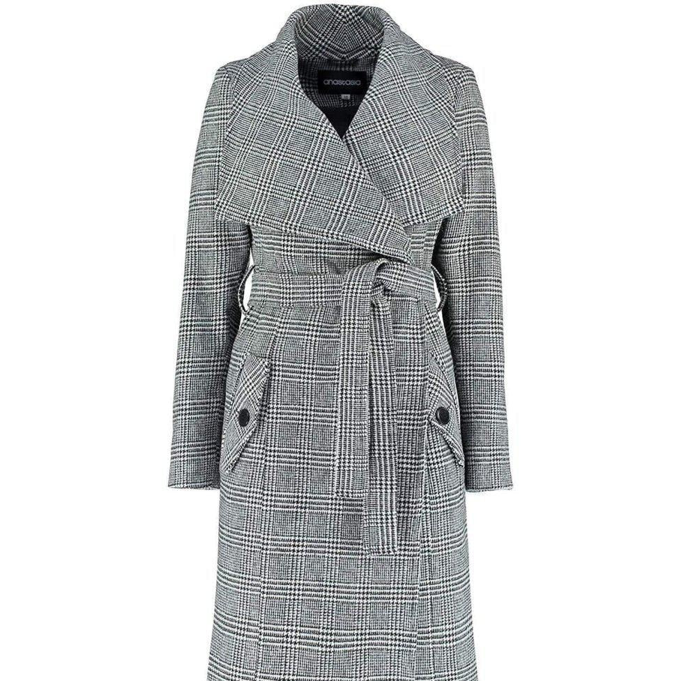 Plaid patterned coat with a belt on a white background