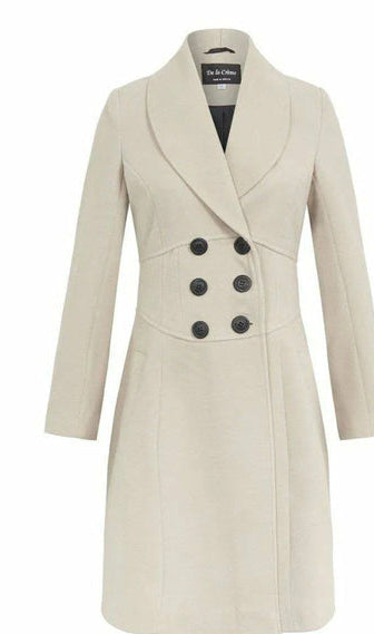 Beige coat with black buttons on a white background