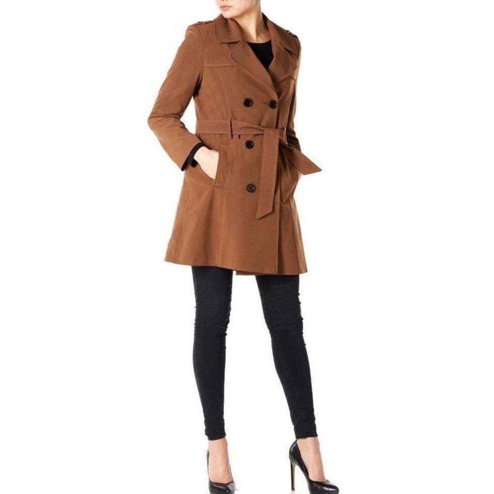 Brown trench coat worn by a person on a white background