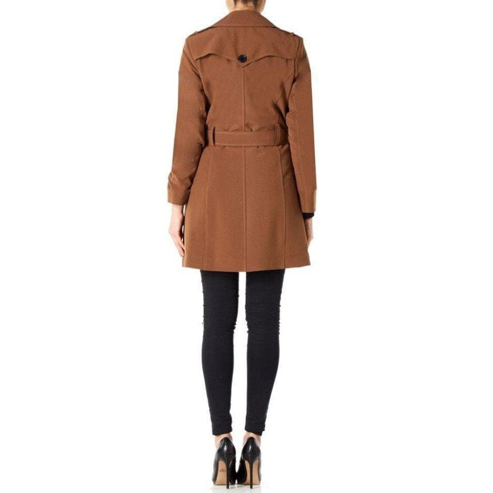 Brown trench coat worn by a person on a white background