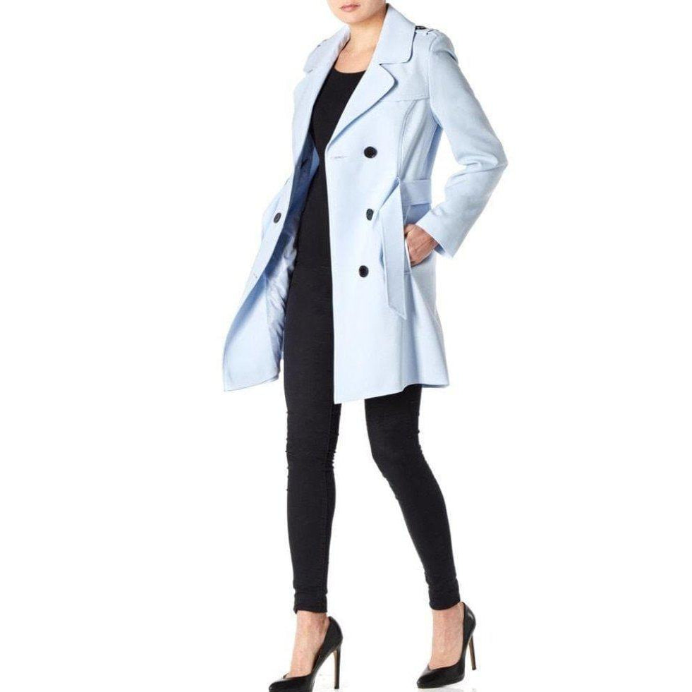 Light blue coat worn by a person on a white background