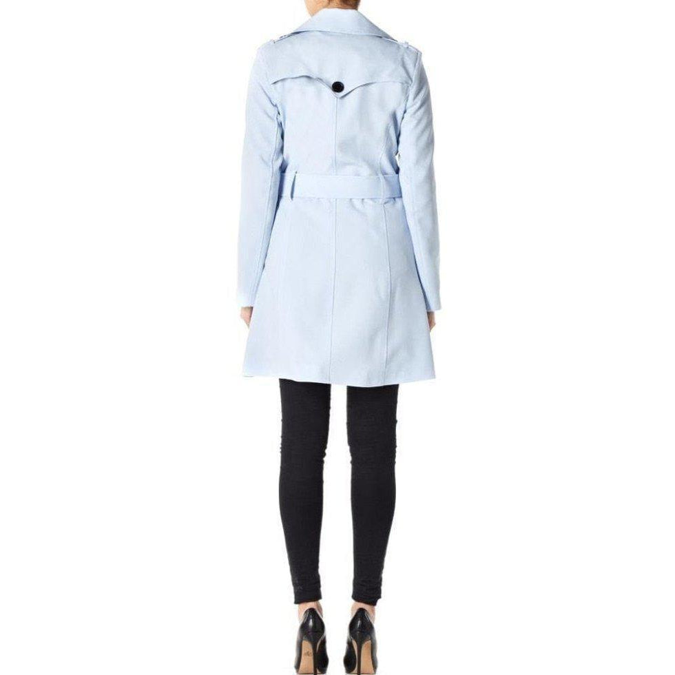 Light blue trench coat worn by a person on a white background