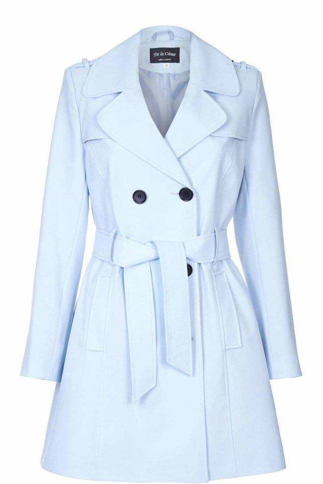 Light blue trench coat with a belt on a white background