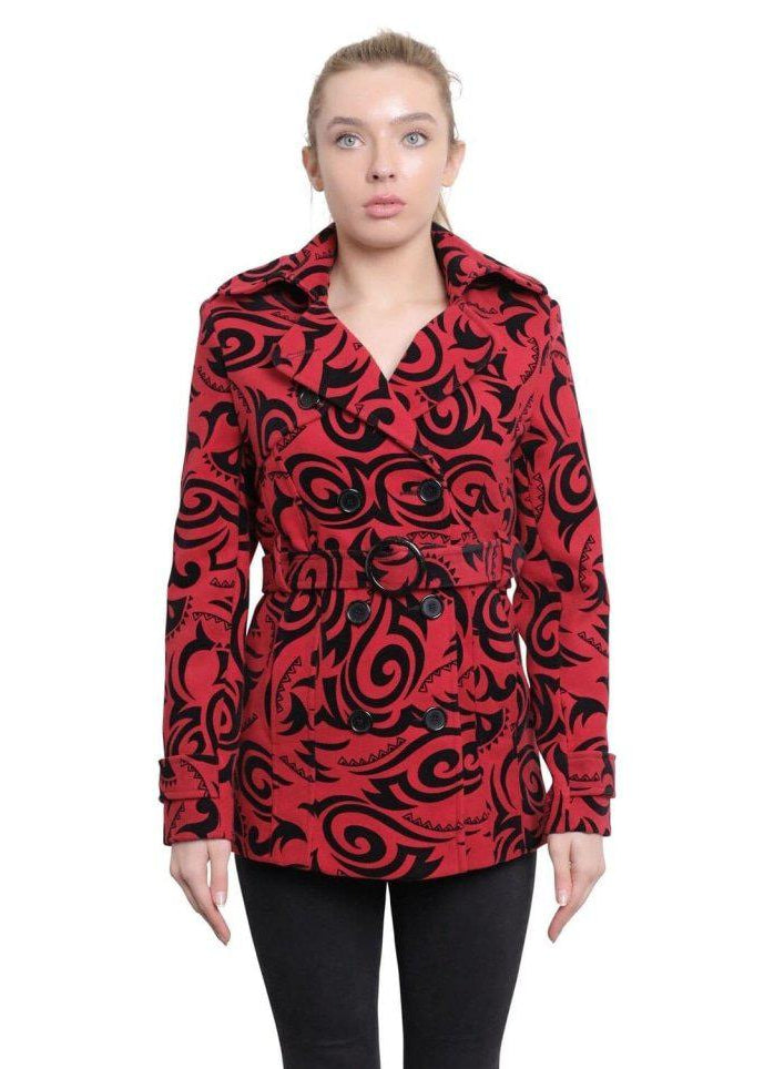 Woman wearing a red and black patterned jacket on a white background