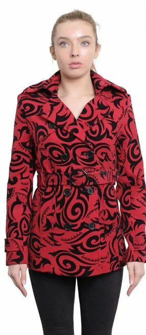 Woman wearing a red and black patterned jacket with a white background