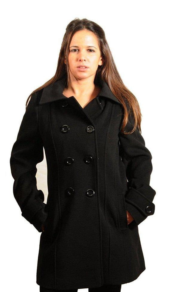 Woman wearing a black coat against a white background