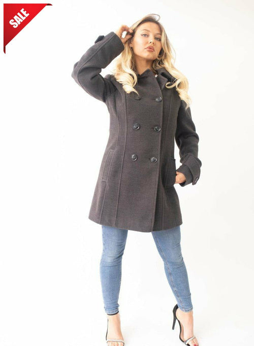 Woman wearing a gray coat with a white background, featuring a sale label.