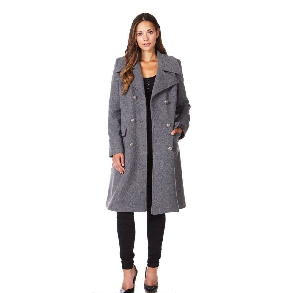 Woman wearing a gray coat on a white background