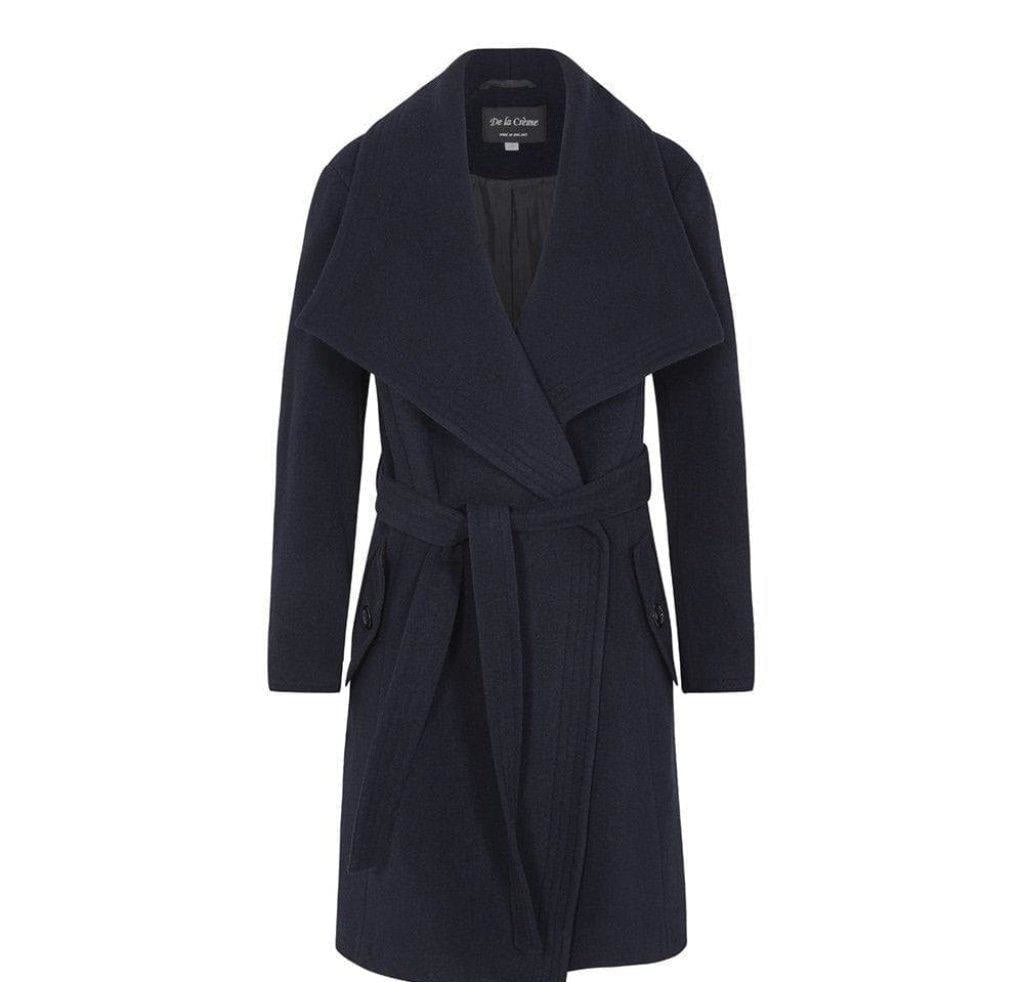 Navy blue coat with a belt on a white background.