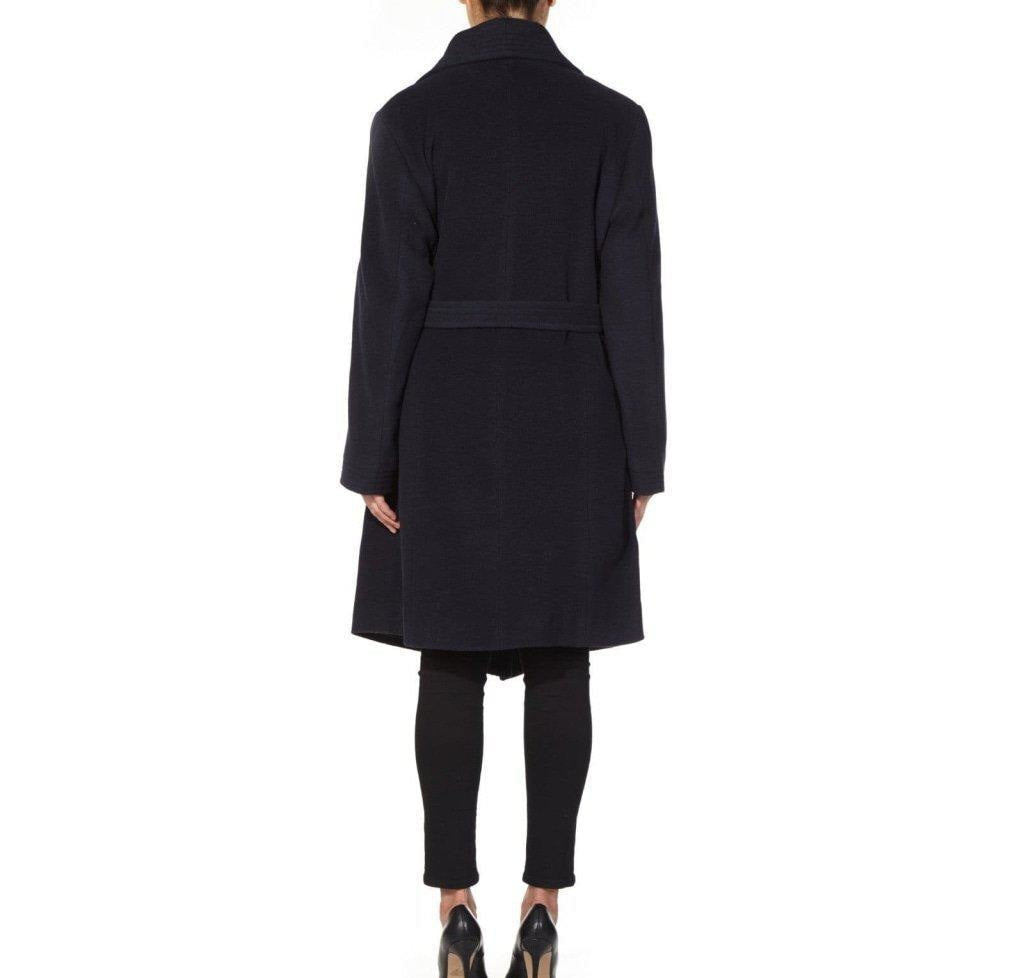 Person wearing a black coat on a white background with 'De la Creme Fashions' branding.