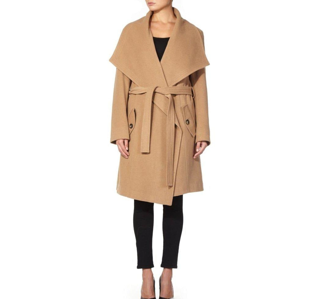 Beige trench coat worn by a model on a white background