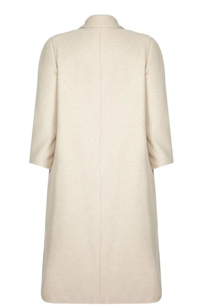 Beige coat on a white background