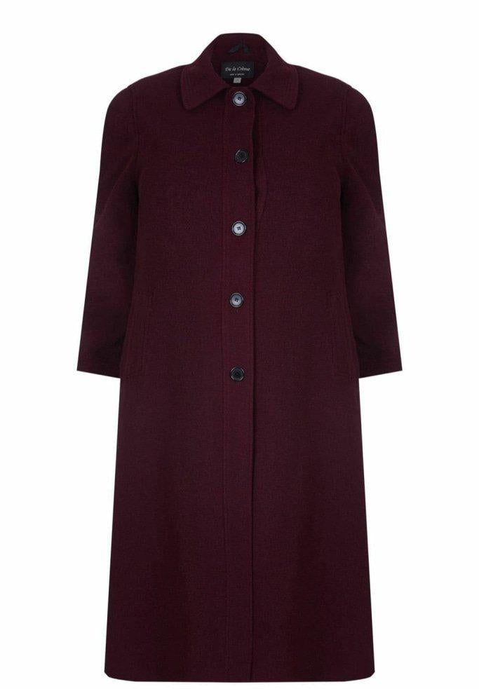 Burgundy coat with buttons on a white background
