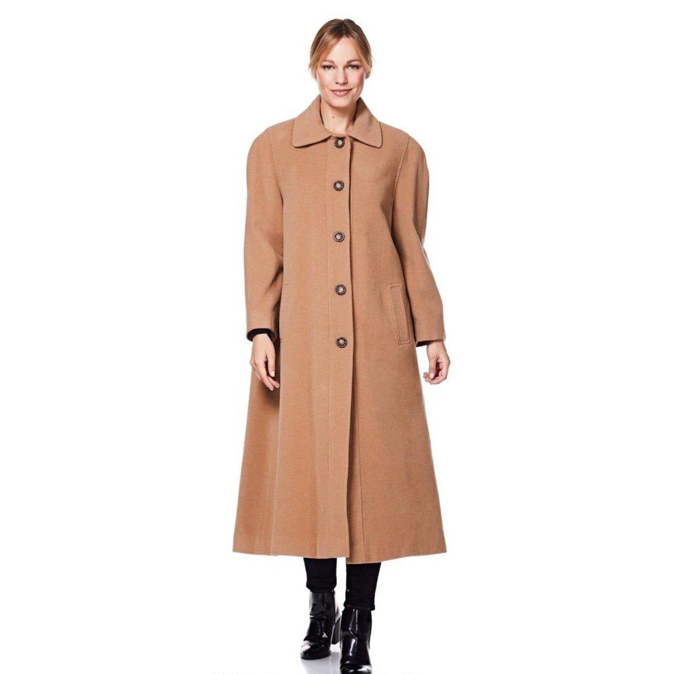 Woman wearing a long brown coat on a white background