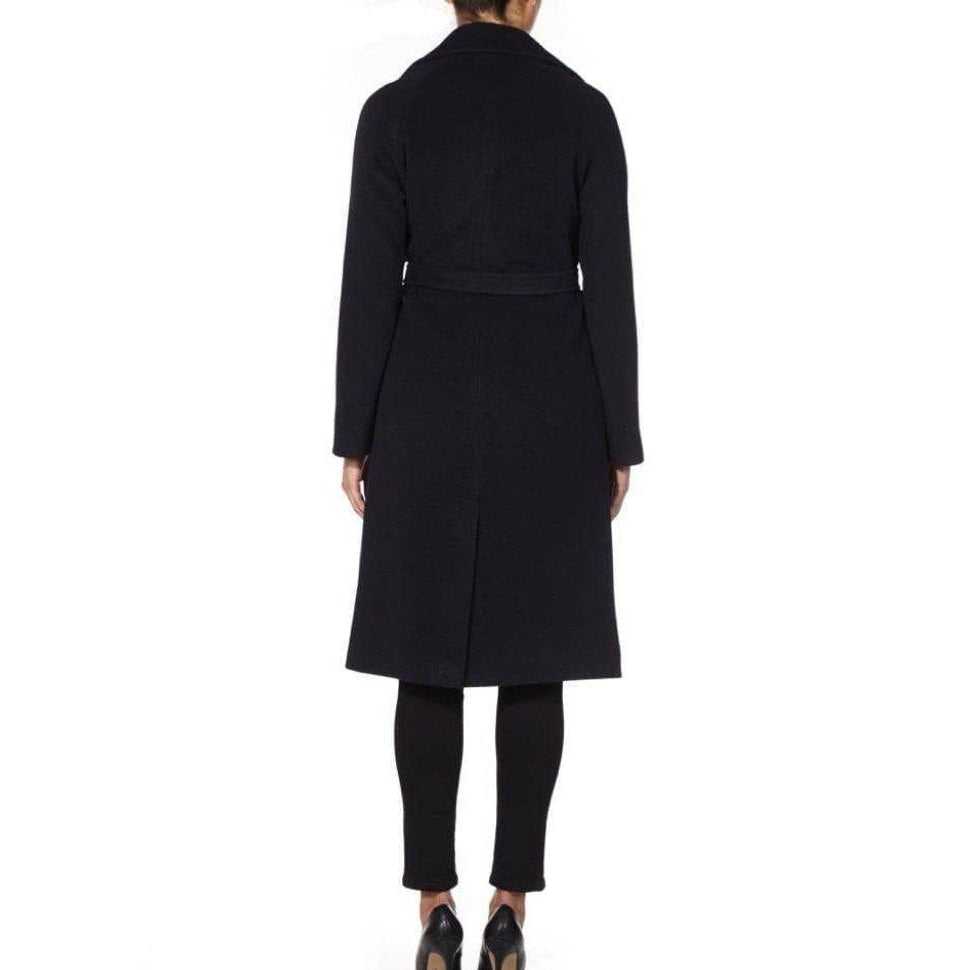 Black coat worn by a person on a white background