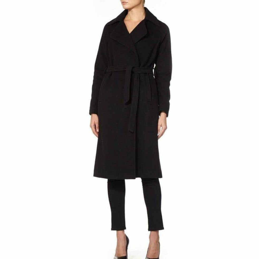 Black coat worn by a model on a white background