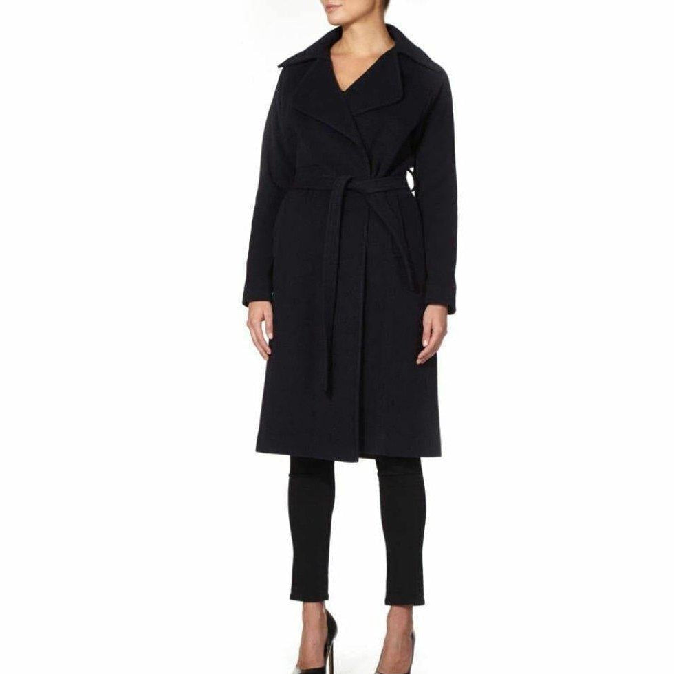 Black coat worn by a model on a white background